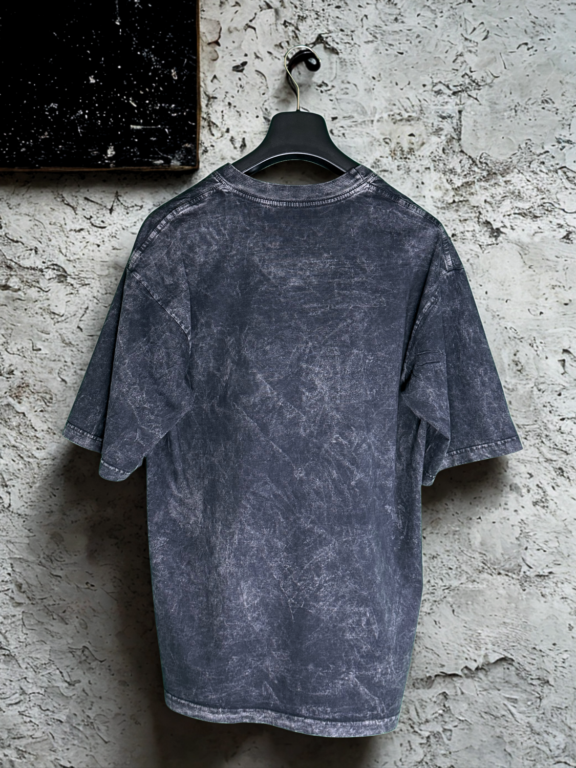 La primera acid wash gris
