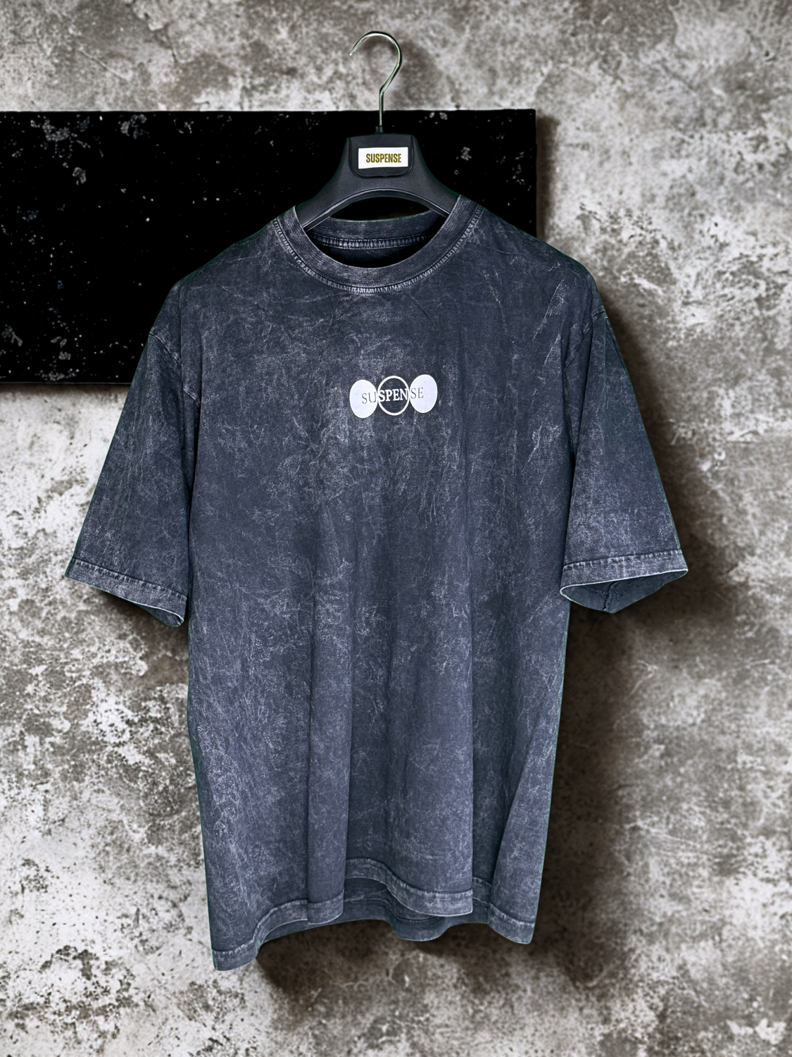 La primera acid wash gris